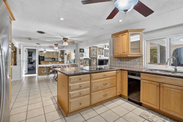 1051 W Tropical Way, Plantation, FL 33317