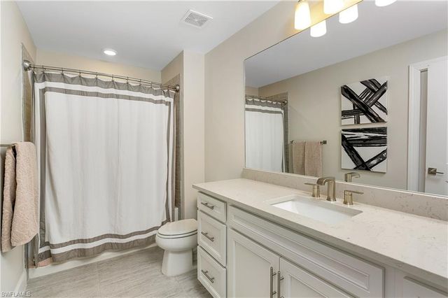 9517 Night Heron LN, Naples, FL 34120