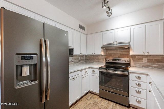 4943 E INDIAN SCHOOL Road 4, Phoenix, AZ 85018