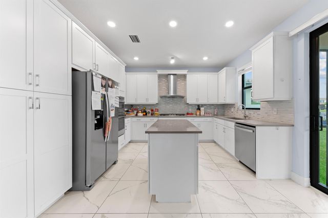 8716 Grand Prix Lane, Boynton Beach, FL 33472