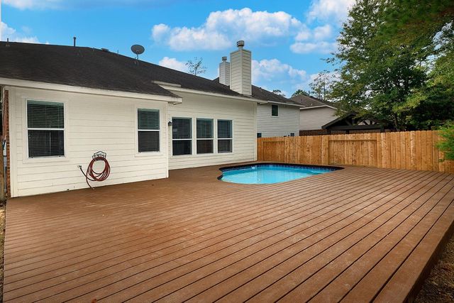 47 N Spinning Wheel Circle, The Woodlands, TX 77382