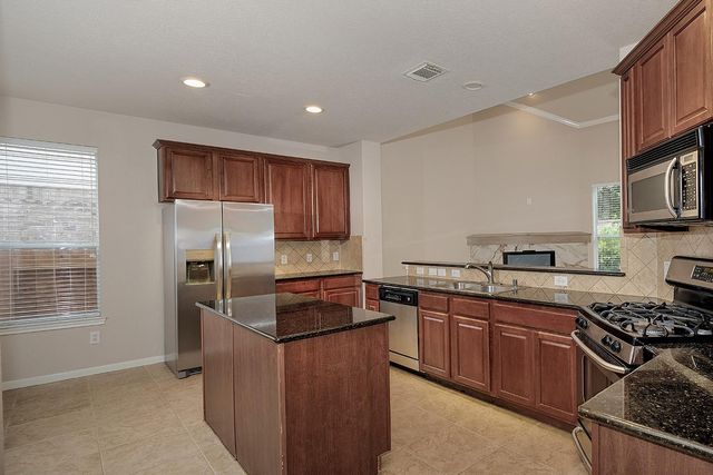 47 N Spinning Wheel Circle, The Woodlands, TX 77382