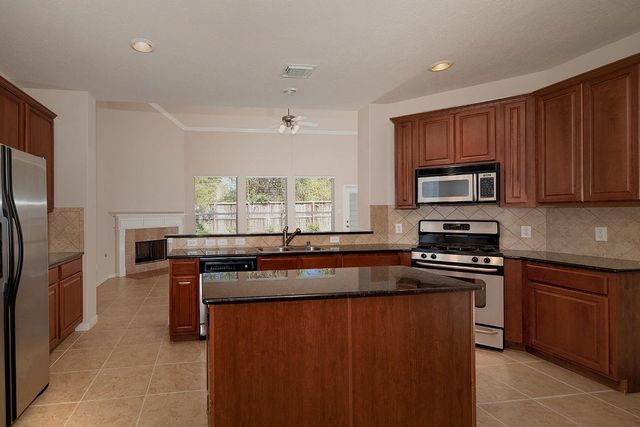 47 N Spinning Wheel Circle, The Woodlands, TX 77382