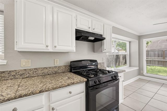 12403 Meadow Ridge Dr, Stafford, TX 77477