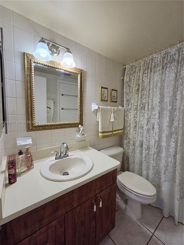 7707 Camino Real 209, Miami, FL 33143