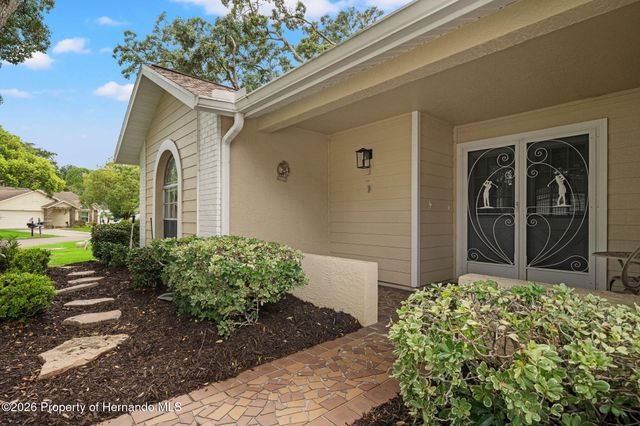 7143 Crown Oaks Drive, Spring Hill, FL 34606