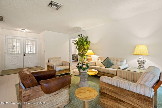 7143 Crown Oaks Drive, Spring Hill, FL 34606