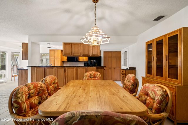 7143 Crown Oaks Drive, Spring Hill, FL 34606