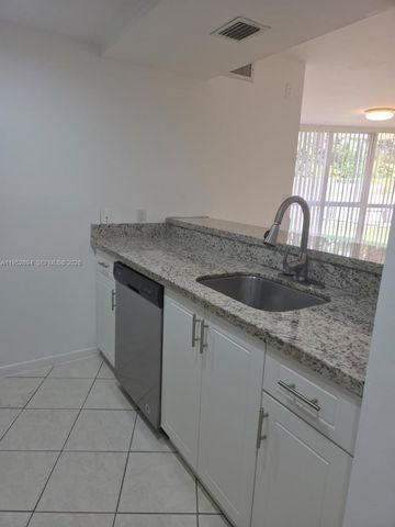 7075 NW 186th St C104, Hialeah, FL 33015