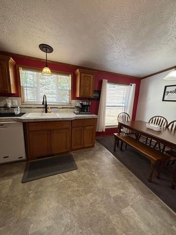 7502 Tolliver Street, Mears, MI 49436