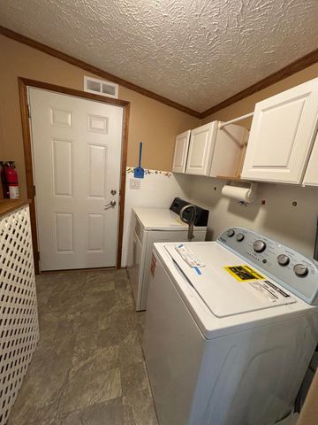 7502 Tolliver Street, Mears, MI 49436