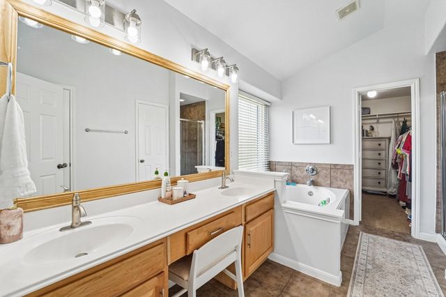 9806 Lynette Falls Drive, Houston, TX 77095