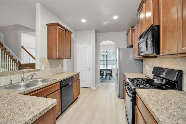 9587 E Woodmark, Conroe, TX 77304