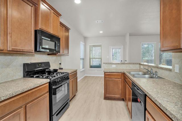 9587 E Woodmark, Conroe, TX 77304