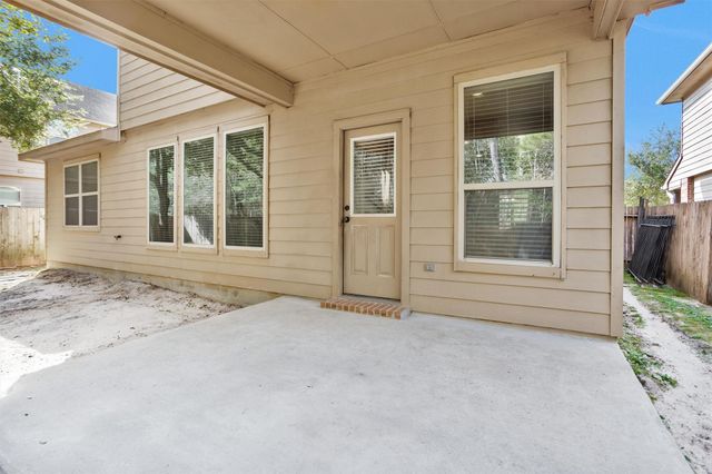 9587 E Woodmark, Conroe, TX 77304