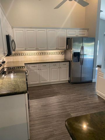 6031 Wedgewood Village Circle, Greenacres, FL 33463