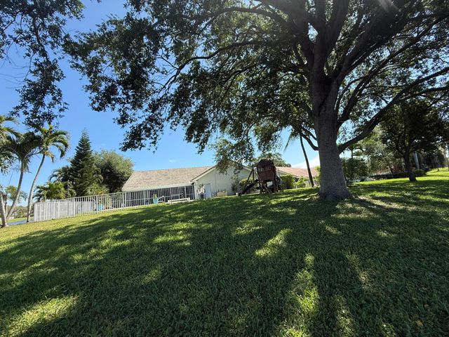 6031 Wedgewood Village Circle, Greenacres, FL 33463