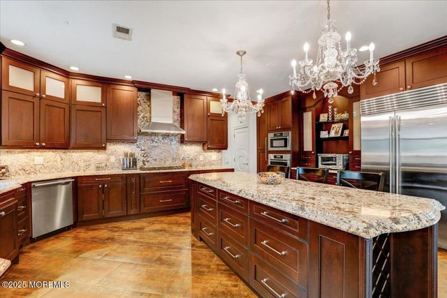 11 Hemingway Court, Morganville, NJ 07751