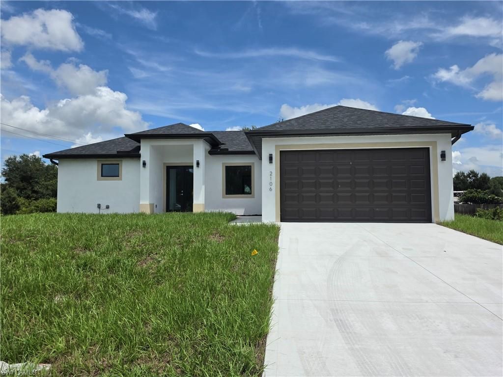 2106 W 17th ST, LEHIGH ACRES, FL 33972 — exterior