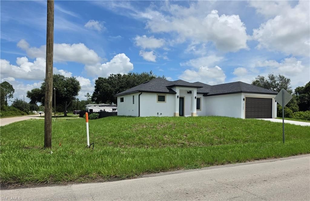 2106 W 17th ST, LEHIGH ACRES, FL 33972 — photo 2