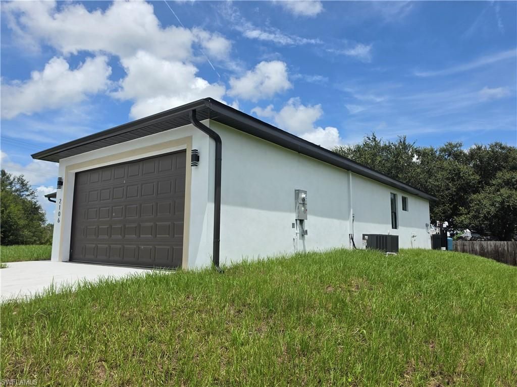 2106 W 17th ST, LEHIGH ACRES, FL 33972 — photo 3