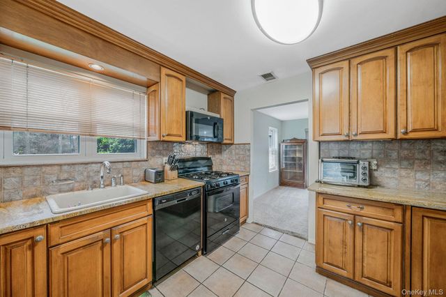 47 Madder Lake Circle, Commack, NY 11725