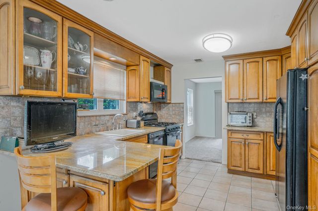 47 Madder Lake Circle, Commack, NY 11725