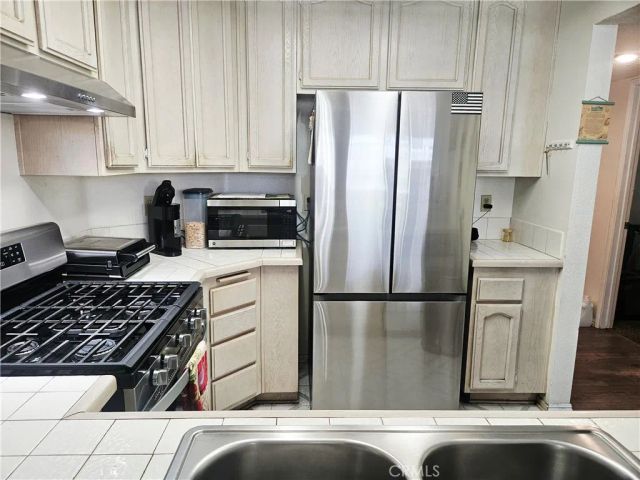12864 Sycamore Village Dr., Norwalk, CA 90650