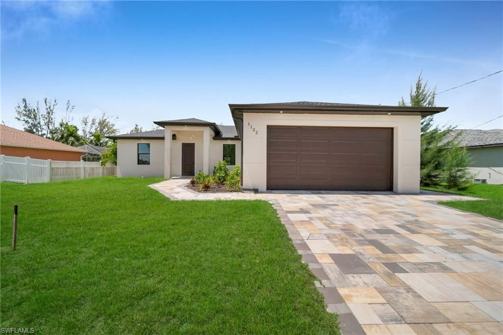 1122 NW 26th AVE, CAPE CORAL, FL 33993 — exterior