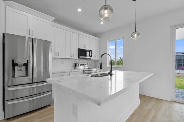 13438 MCINTOSH AVENUE, Port Charlotte, FL 33981