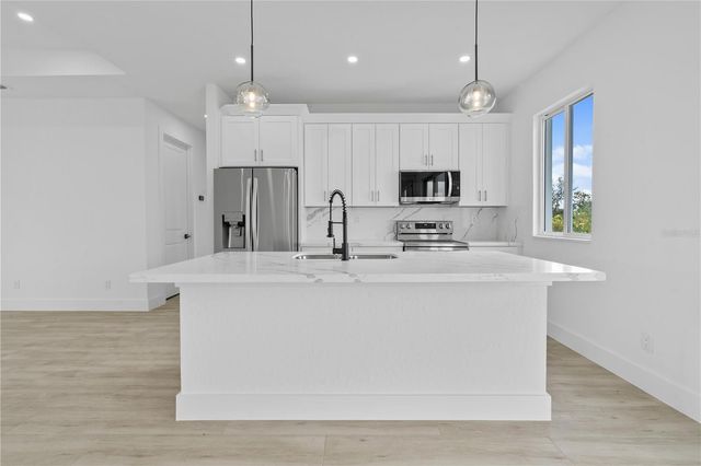 13438 MCINTOSH AVENUE, Port Charlotte, FL 33981