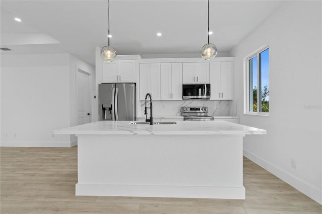 13438 MCINTOSH AVENUE, Port Charlotte, FL 33981