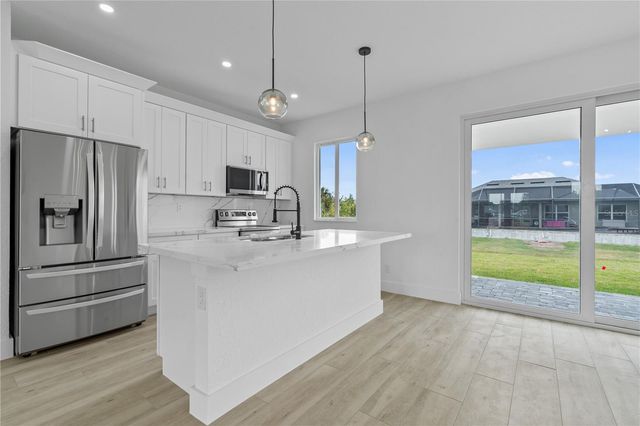 13438 MCINTOSH AVENUE, Port Charlotte, FL 33981