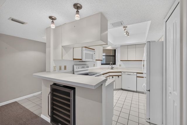 700 Uno Lago Drive 403, Juno Beach, FL 33408