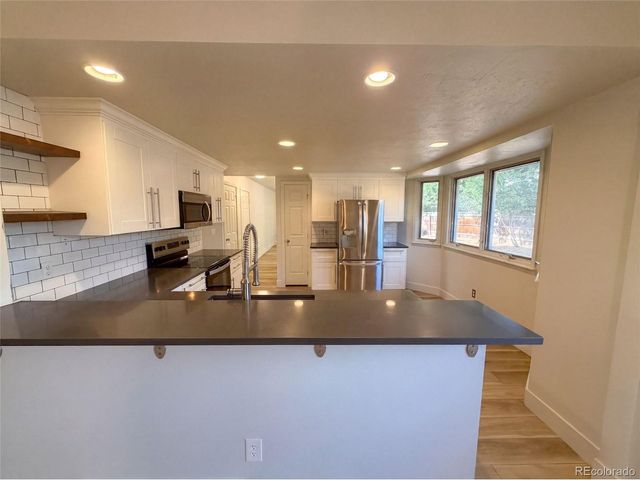 7447 S Ames Ct, Littleton, CO 80128