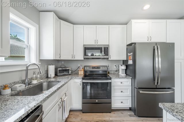 145 Whispering Pines Drive, Fenton, MI 48430