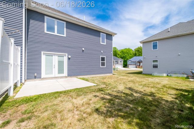 145 Whispering Pines Drive, Fenton, MI 48430