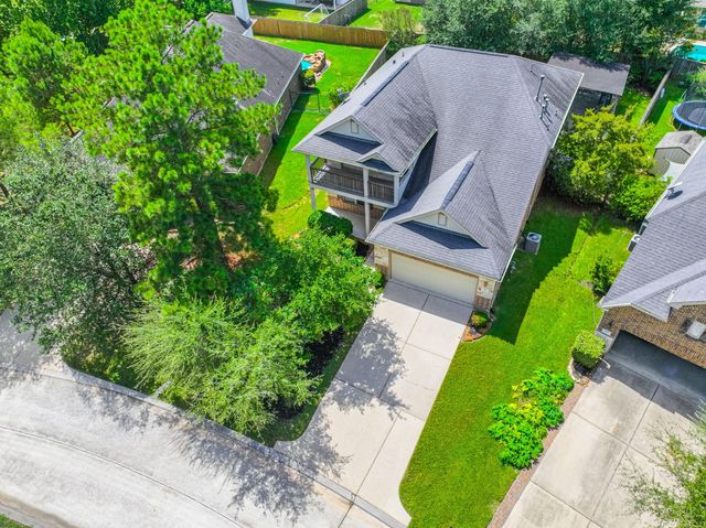 63 W Deer River Circle, The Woodlands, TX 77389