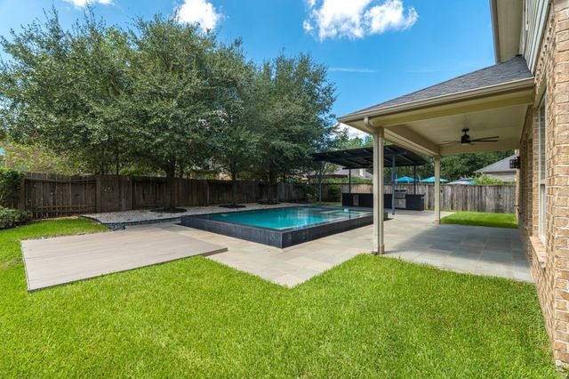 63 W Deer River Circle, The Woodlands, TX 77389