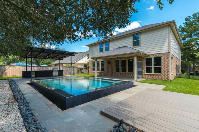 63 W Deer River Circle, The Woodlands, TX 77389
