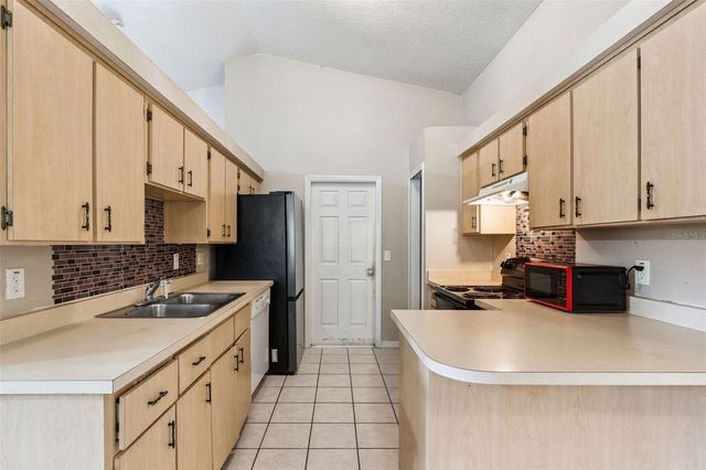 11526 HUGGINS STREET, Leesburg, FL 34788
