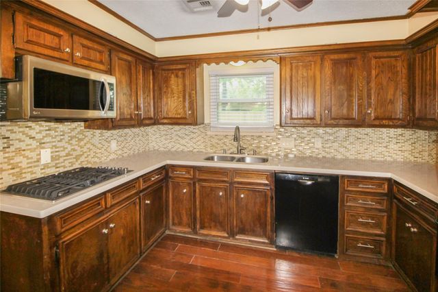 1106 Castle Hill Trail, Kingwood, TX 77339