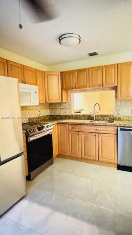 7148 Woodmont Ave, Tamarac, FL 33321