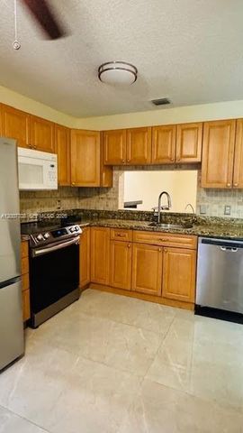 7148 Woodmont Ave, Tamarac, FL 33321