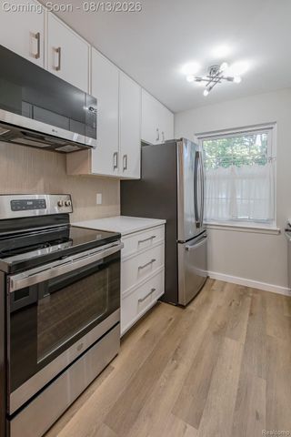 104 Lake Village Drive, Walled Lake, MI 48390