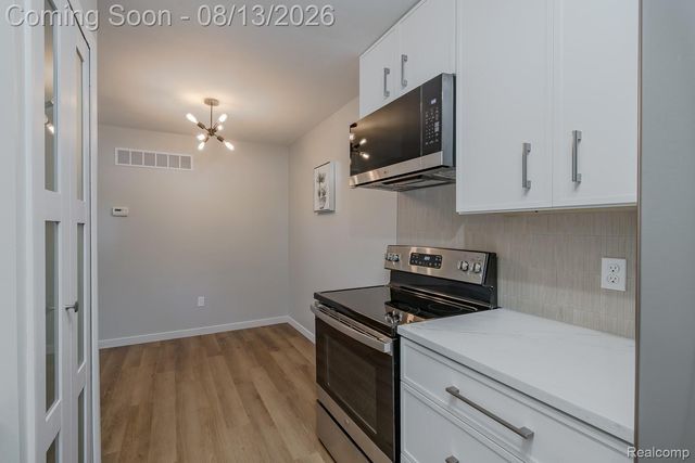 104 Lake Village Drive, Walled Lake, MI 48390