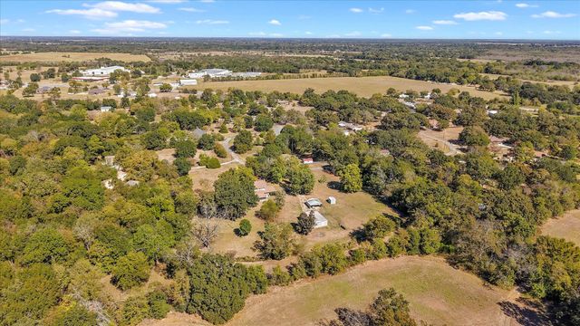 3136 Woodglen Drive, Commerce, TX 75428