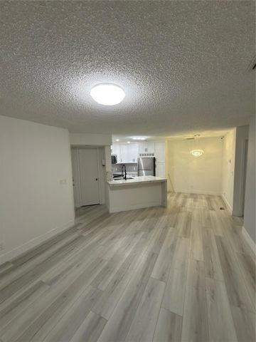 3470 Pinewalk Drive 214, Margate, FL 33063