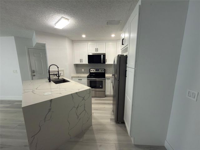 3470 Pinewalk Drive 214, Margate, FL 33063