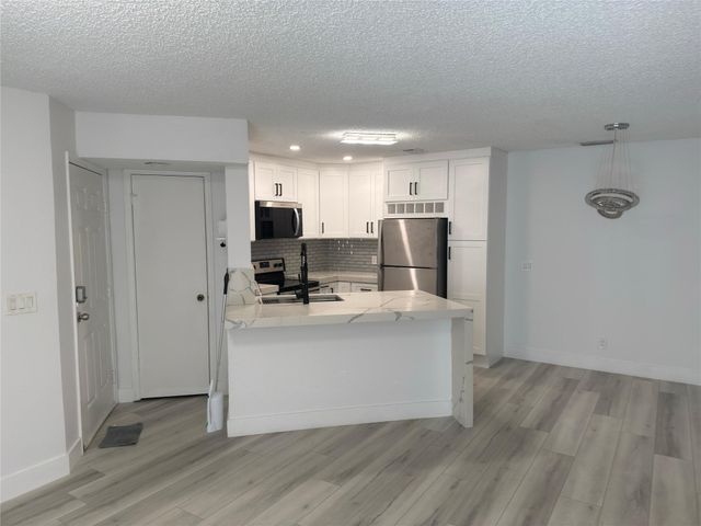 3470 Pinewalk Drive 214, Margate, FL 33063